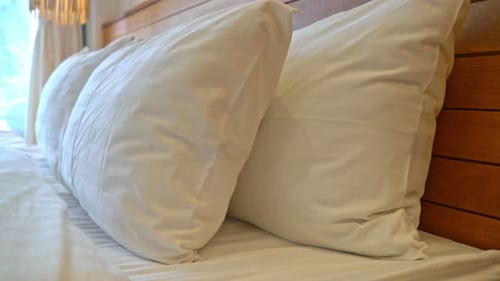 Inviting Bedroom Featuring Comfortable Bed and Pillows