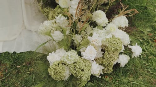Beautiful Wedding Decor Near the Arch White and Green Flowers is Absolutely Perfect for Weddings and
