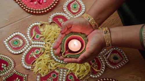 Ornate Diya Oil Lamp held During Diwali