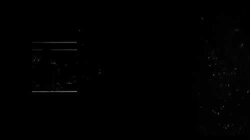 Fragment Collection: Effect of shards of glass falling down from a square glass over a black backgro