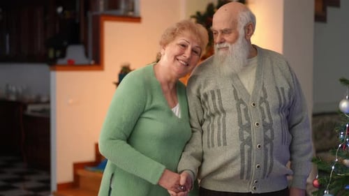 Loving Senior Couple Enjoying Christmas Together