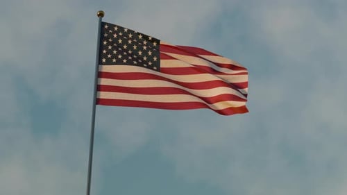 United States Flag Waving Against a Blue Sky