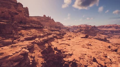 Colorful Sandstone Formations Stretching Across Distant Horizon Line