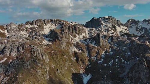Rocky mountains and valley before sunset aerial