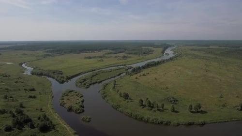 Top View of Beautiful River Turns on Background of Green Fields Stock Footage Summer Panorama of