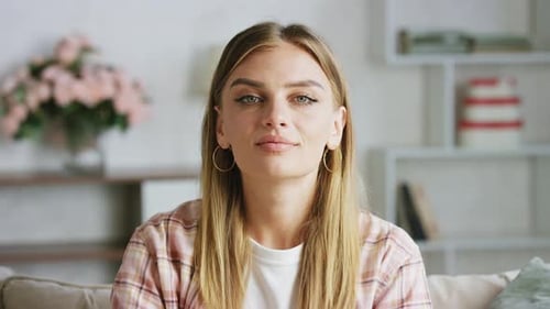 Beautiful Woman Smiling in a Living Room
