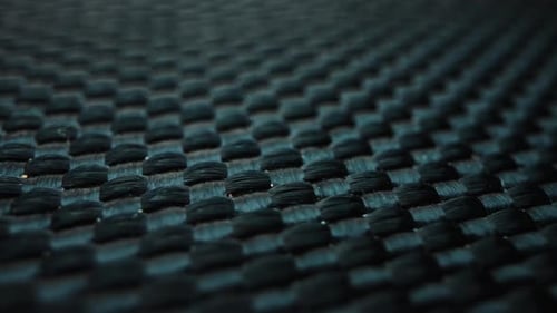 Close-Up of a Black Woven Carbon Fiber Texture