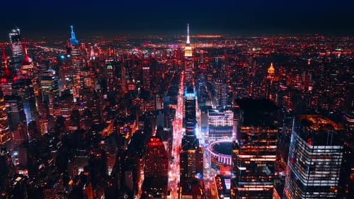 Light streets of New York, USA at night. Drone footage above the city scenery