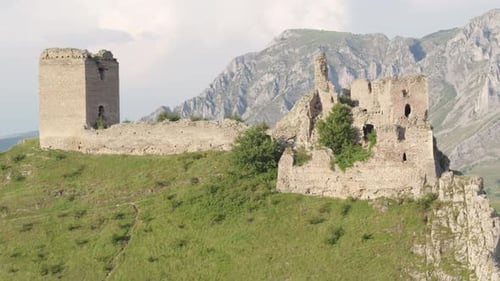 Aerial drone shot of the medieval Trascău (Colțești) Fortress ruins in Transylvania.