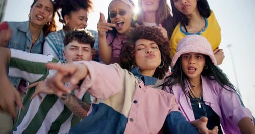 Gen z friends, dancing and outdoor with face, happy or fashion in streetwear at college in summer
