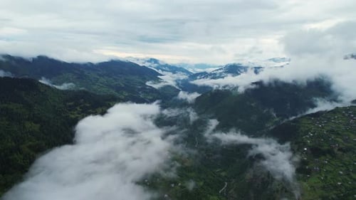 Aerial View of Mountains and Lush Green Valleys