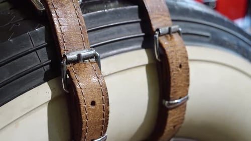 Close up of Tire with Leather Straps