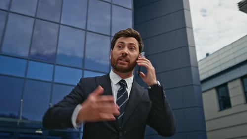 Stressed Entrepreneur Shouting Cellphone Standing Urban Street Arguing Closeup