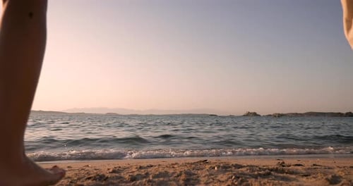 Couple Dancing on Beach at Sunset