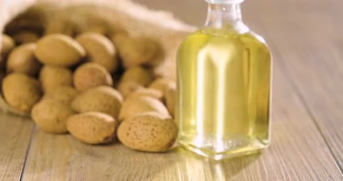 Almond oil composition used for cosmetics, spa, wellness centers. Perfect body oil and moisturizin