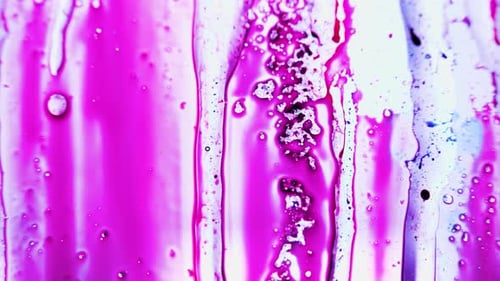 Abstract Paint Dripping Texture in Bright Pink and Blue