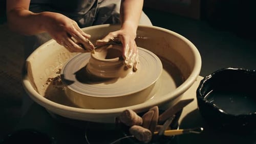 Woman Potter Works with Clay on Master Class in Studio Working Process in Ceramic Workshop Potter