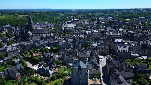 Towards aerial movement into the Tour de l'Horloge or clock tower with Saint Sauveur basilica and th