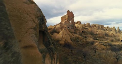 aerial view of cappadocia. Aerial shot of Goreme Valley by drone. Close up view of cave houses. 4K.