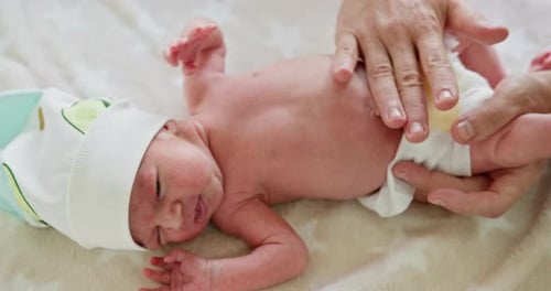 Gentle Infant Massage on Blanket