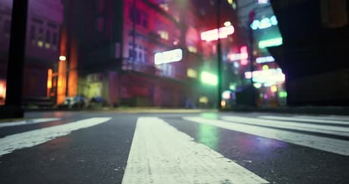 Vibrant Urban Street in a Neon Lit Cityscape at Night During Rain