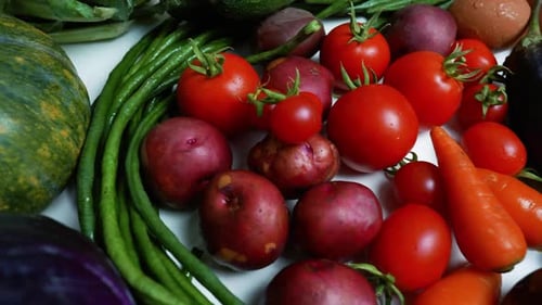 Fresh Vegetables: Vibrant Tomatoes, Potatoes, and Greens