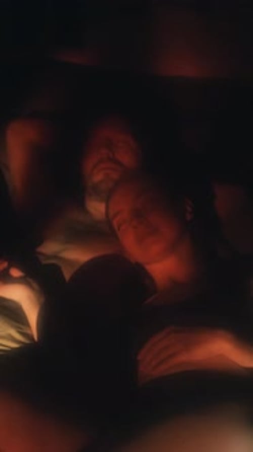 Loving Couple Embracing in the Dim Light