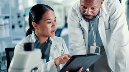 Scientists Collaborating in a Modern Lab Setting