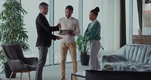 Engaging Business Meeting Taking Place in a Modern Office Space with Dedicated Professionals