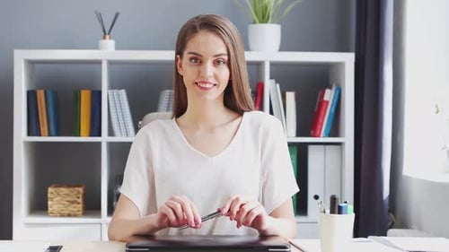 Young Woman Works at Home Office Using Computer Workplace of Female Entrepreneur Freelancer or
