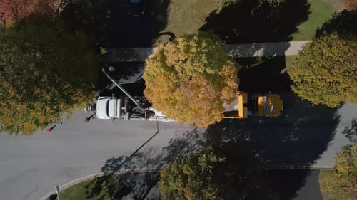 Aerial Shot of Street Pavement Machinery in Suburban Region