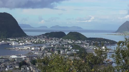 Ålesund cityscape showing bridges, mountains, and waterways in norway