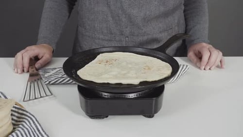 Cooking Flatbread in Cast Iron Pan
