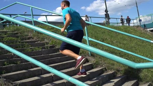 Young Man Jogging on Stairs in the City, Super