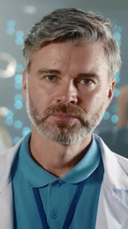 Professional Male Data Center Specialist Wearing Lab Coat in Server Room Experienced Physician