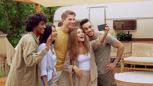 Friends Enjoying a Fun Summer Weekend at a Campsite While Taking Selfies