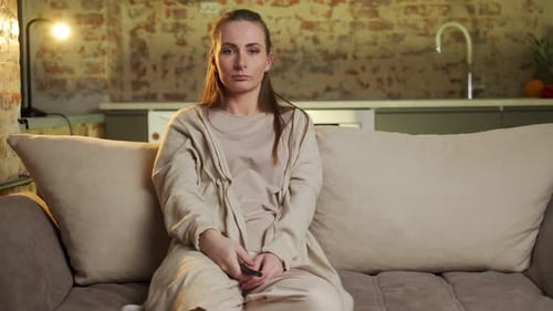 Woman Watching Television, Shocked and Surprised