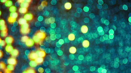 Blurred light spots seamless loop circle color bokeh lights background. defocused lens light