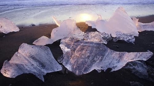 Icebergs At Sunset On Black Volcanic Beach In Iceland Nature