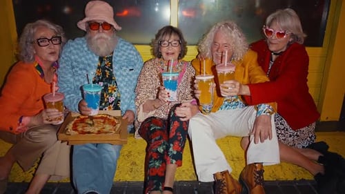 Senior friends gathering on city streets,