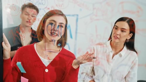 Business Team Brainstorming Plans at Modern Workplace