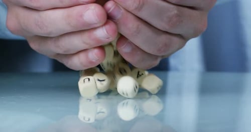 cascade of wooden letters in slow motion. Concept: dialog, vocabulary, words, speak, languages.