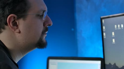 Man With Glasses Looking At Computer Screen