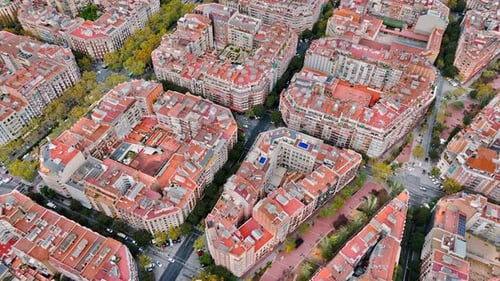 Aerial drone view of Barcelona, Spain. City downtown with famous residential districts, greenery