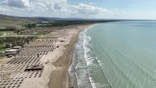 Aerial shot of an empty beach on a sunny day