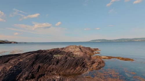 Aerial Perspective Volcanic Rocky Norway Bathed in Sunlight Highlighting Stone Textures