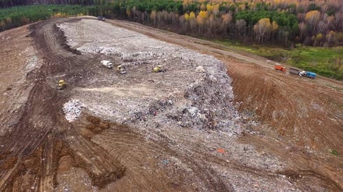 Large Landfill for Household Waste Bulldozers and Garbage Trucks at a Landfill