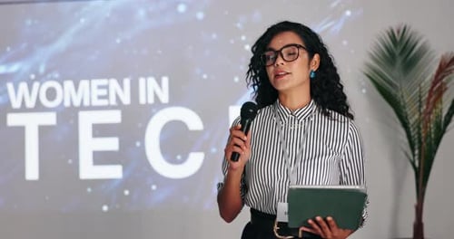Woman Giving Speech at Technology Conference