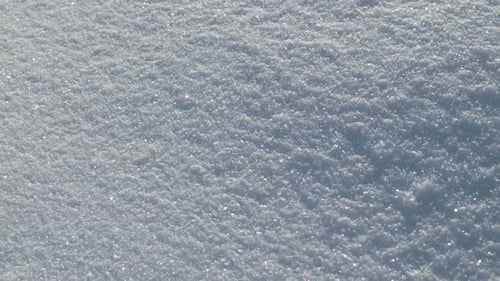 Primer plano de nieve fresca y brillante, paraíso invernal, Alpes suizos, estación de esquí del glaciar de Zermatt