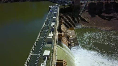 Person walking along the Goulburn Weir, Victoria, Australia.